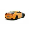 Set figurină + machetă auto Jada - NARUTO Uzumaki + 2009 NISSAN GT-R [1:24]